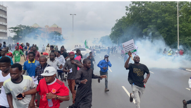 BREAKING: Protest Rocks Abuja as Police Tear Gas Peaceful Protesters